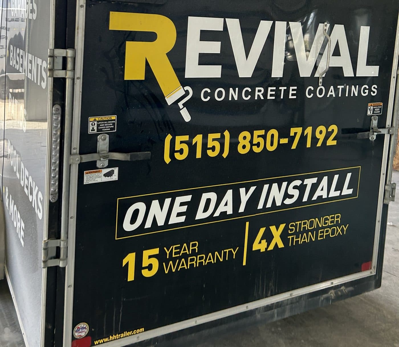 Revival Concrete Coatings trailer with the company logo and one-day install promise